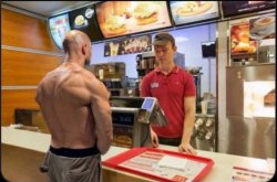 Muscle man ordering  fast food Meme Template