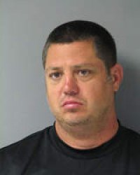 Chaz Bono's mugshot Meme Template