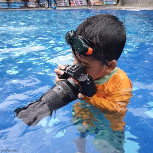 Sony camera in water kid | image tagged in sony camera in water kid | made w/ Imgflip meme maker