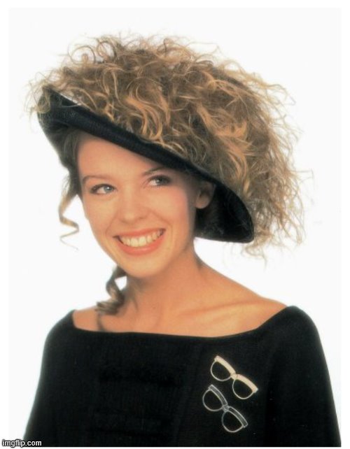In a hat made of her own hair, photo shoot for her first album "Kylie" (1987) | image tagged in kylie hat,1980s,80s music,pop music,hair,hat | made w/ Imgflip meme maker
