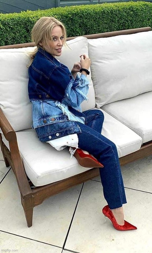 On a couch | image tagged in kylie couch,couch,beautiful woman,cool,jeans,nice | made w/ Imgflip meme maker