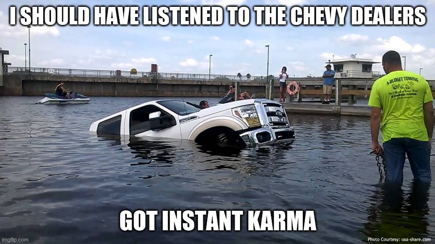 Ford Sucks | I SHOULD HAVE LISTENED TO THE CHEVY DEALERS; GOT INSTANT KARMA | image tagged in were just kidding | made w/ Imgflip meme maker