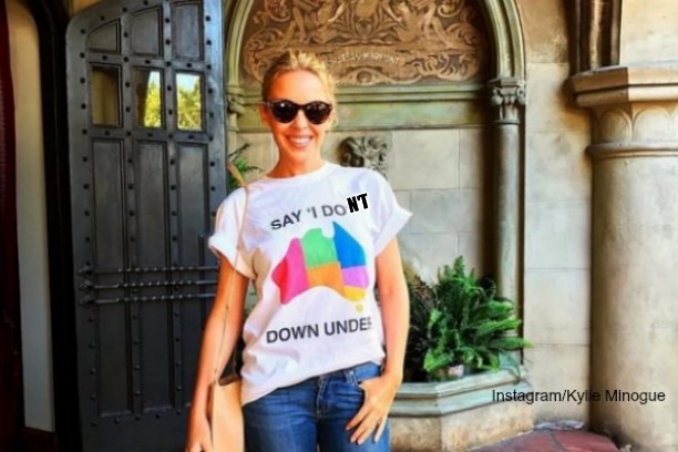 I present to you, the hateful bigot, Kylie Minogue. She's targeted the LGBT community before!!! | N'T | image tagged in kylie gay pride shirt,kylie minogue,kylieminoguesucks,bigotry,hateful,intolerant | made w/ Imgflip meme maker