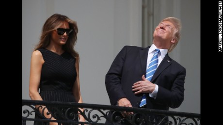 Trump looking at the eclipse Blank Meme Template