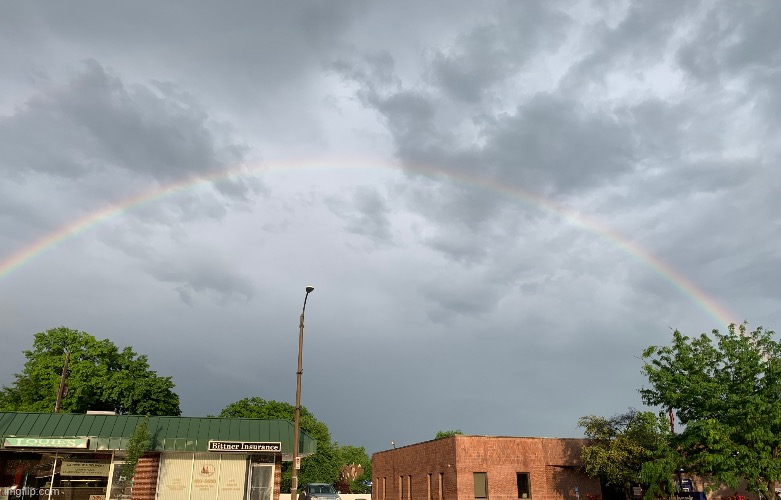 Full rainbow — maybe the biggest and brightest I’ve ever seen. Captured as much of it as I could!! | image tagged in full rainbow,rainbow,photography,photo of the day,perfectly timed photo,weird photo of the day | made w/ Imgflip meme maker