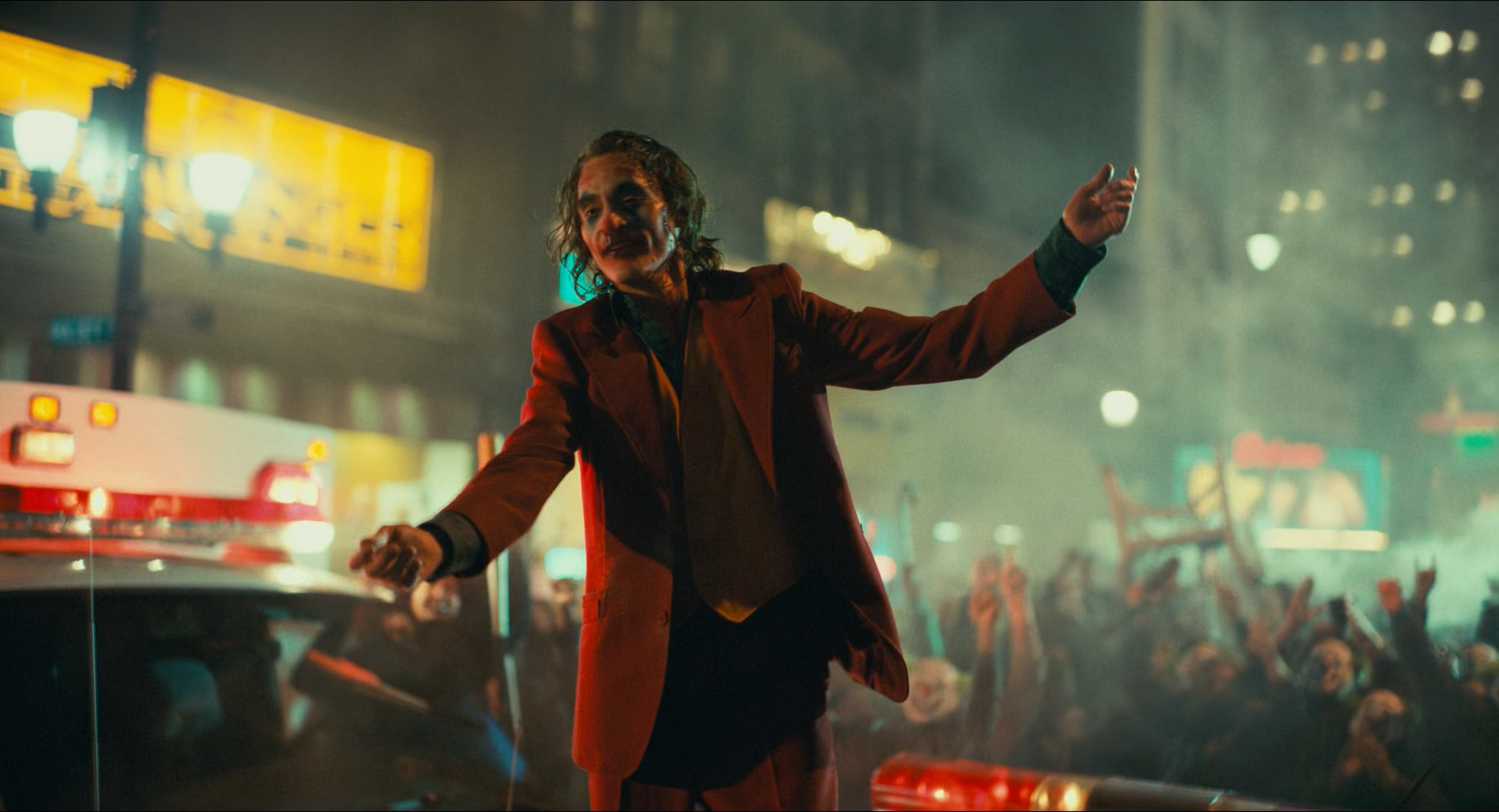Joker standing on cop car during riot, in Joker 2019 (Batman) Blank Meme Template