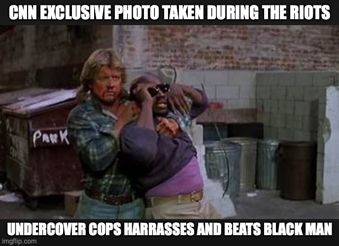 CNN EXCLUSIVE PHOTO TAKEN DURING THE RIOTS; UNDERCOVER COPS HARRASSES AND BEATS BLACK MAN | image tagged in riots,cnn | made w/ Imgflip meme maker