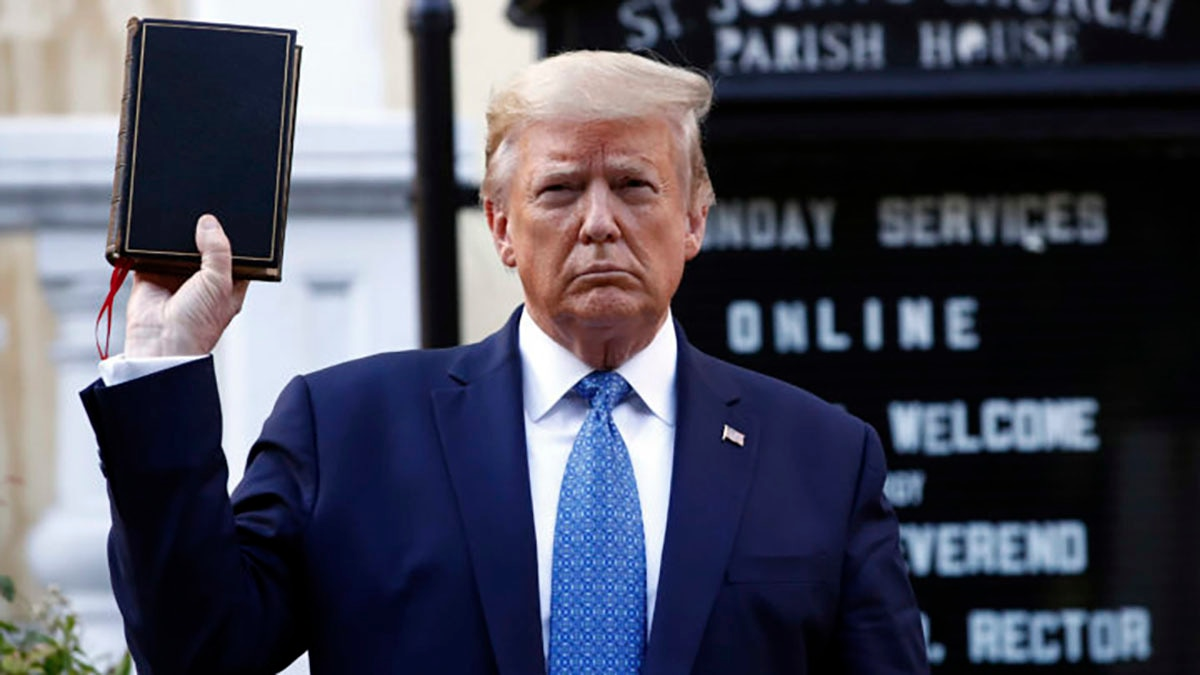 High Quality Trump holds up a book he has never read, the Bible Blank Meme Template