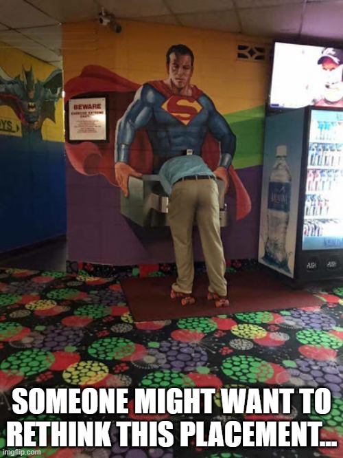 Down on the Man of Steel | SOMEONE MIGHT WANT TO RETHINK THIS PLACEMENT... | image tagged in superman | made w/ Imgflip meme maker