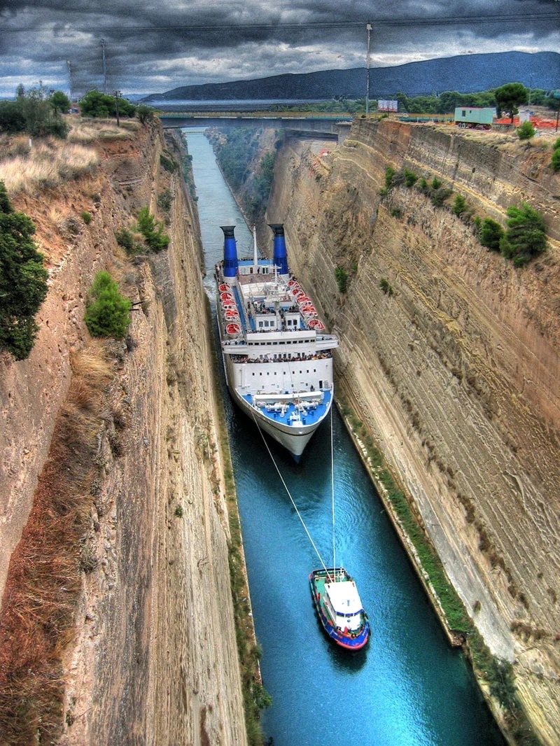 Boat towed between cliffs Blank Meme Template