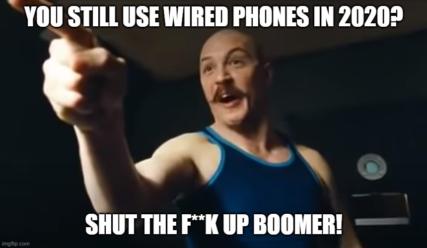 bronson shut up | YOU STILL USE WIRED PHONES IN 2020? SHUT THE F**K UP BOOMER! | image tagged in bronson shut up,stfu | made w/ Imgflip meme maker