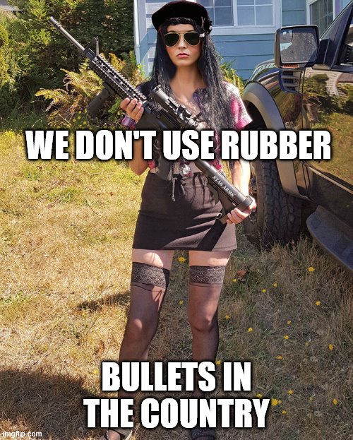 We Don't Use Rubber Bullets In The Country | WE DON'T USE RUBBER; BULLETS IN THE COUNTRY | image tagged in country woman | made w/ Imgflip meme maker