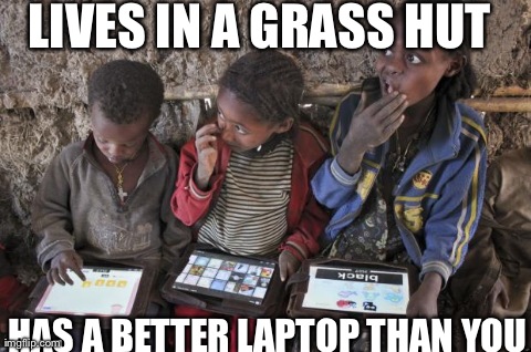 LIVES IN A GRASS HUT HAS A BETTER LAPTOP THAN YOU | image tagged in african laptop kids | made w/ Imgflip meme maker