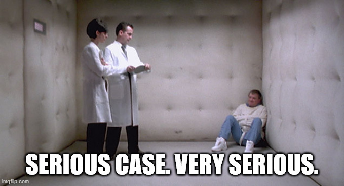 Man in Cell in Straightjacket | SERIOUS CASE. VERY SERIOUS. | image tagged in man in cell in straightjacket | made w/ Imgflip meme maker