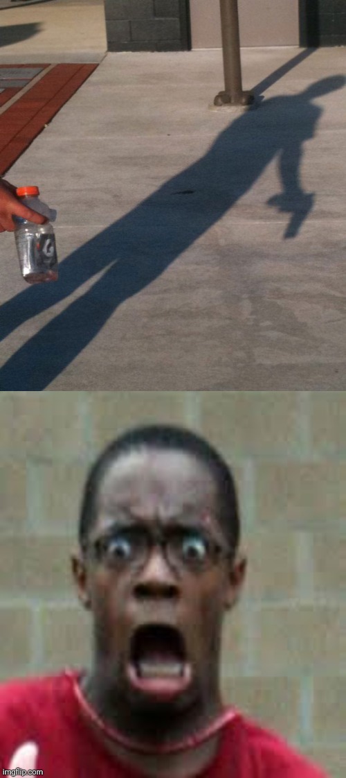 The guy holding a Gatorade bottle casts a shadow of the shooter. | image tagged in scared black guy,shadow,shooter,gatorade,dark humor,memes | made w/ Imgflip meme maker