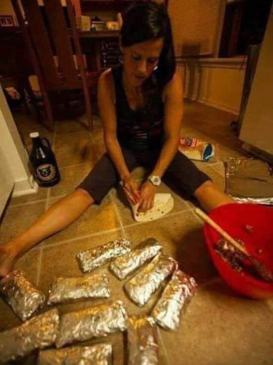 Girl on floor wrapping burritos Blank Meme Template