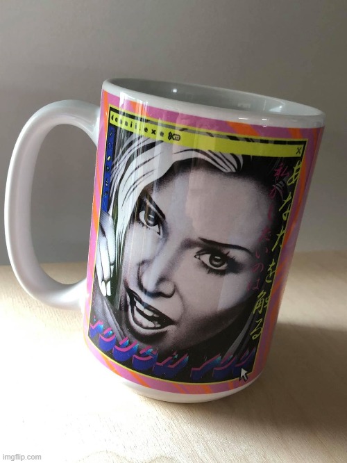 On a coffee mug. lol | image tagged in dannii coffee mug,coffee,coffee addict,fan art,artwork,pop music | made w/ Imgflip meme maker