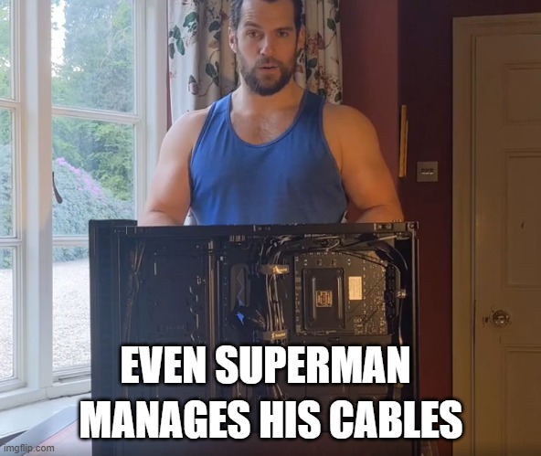 Even superman manages his cables | MANAGES HIS CABLES; EVEN SUPERMAN | image tagged in superman cable managemnet | made w/ Imgflip meme maker