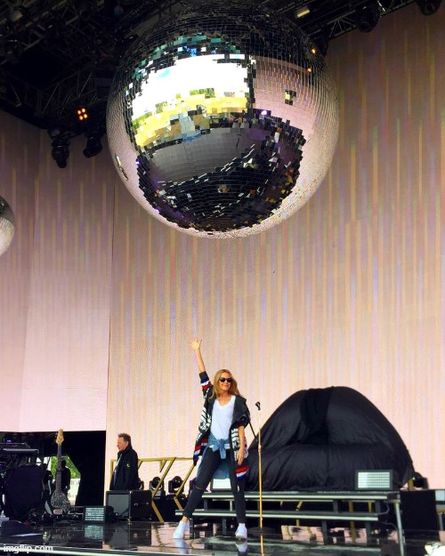 Pre-show by the looks of it with the world's largest disco ball(?) --June 2015 | image tagged in kylie disco ball,disco,performance,stage,singer,wave | made w/ Imgflip meme maker