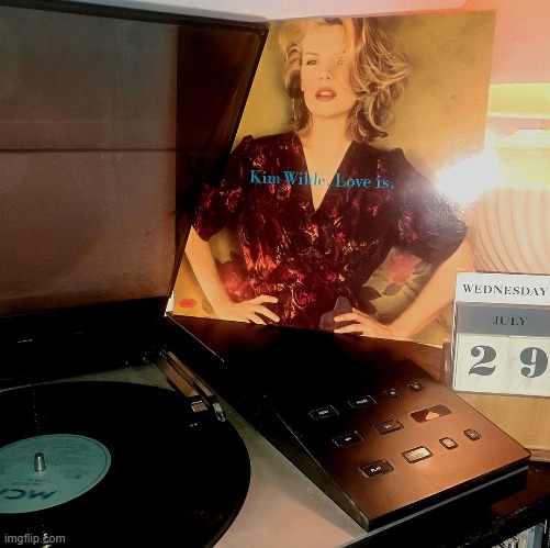Loved this record. Kim Wilde: One-hit wonder in the states but a pop goddess. | image tagged in kim wilde love is,pop music,pop culture,record,playing vinyl records,music | made w/ Imgflip meme maker