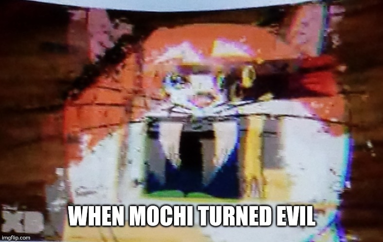 When mochi turned evil | image tagged in big hero 6,disney | made w/ Imgflip meme maker