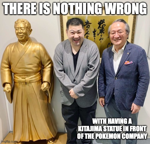 Yutaka Ooe With Saburo Kitajima Statue | THERE IS NOTHING WRONG; WITH HAVING A KITAJIMA STATUE IN FRONT OF THE POKEMON COMPANY | image tagged in statues,enka,memes,yutaka ooe | made w/ Imgflip meme maker