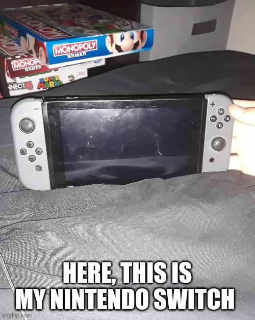 HERE, THIS IS MY NINTENDO SWITCH | image tagged in memes,nintendo,nintendo switch | made w/ Imgflip meme maker