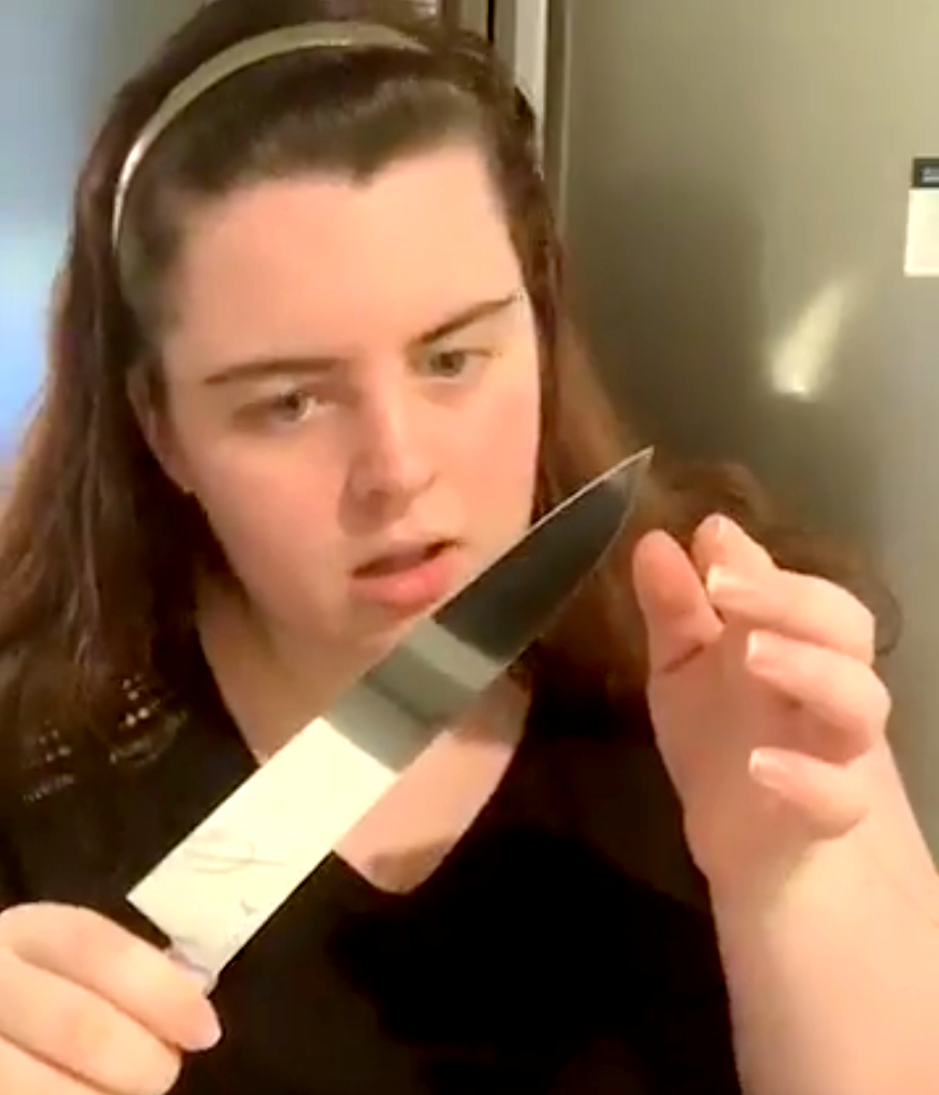High Quality Girl examining knife Blank Meme Template