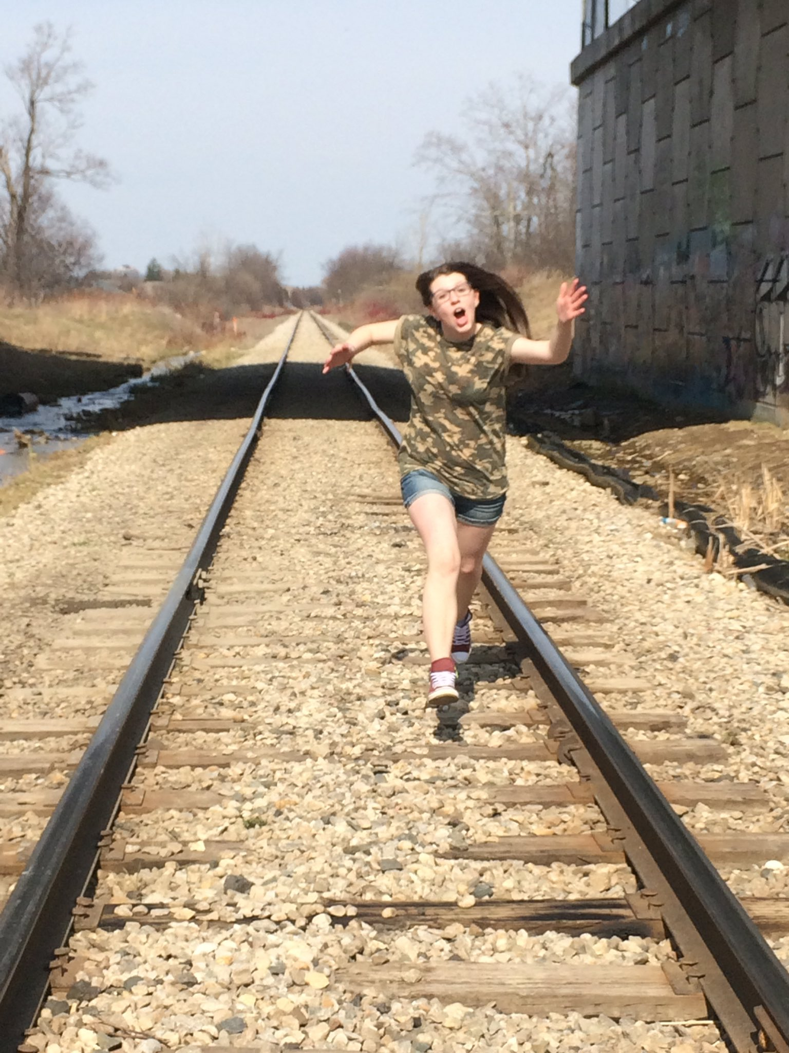 girl running on train tracks Blank Meme Template
