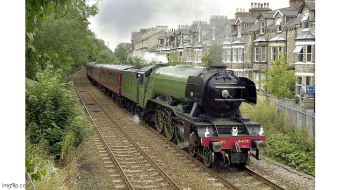 This is 4472 Flying Scotsman | image tagged in steam,locomotive,train,british,trains,famous | made w/ Imgflip meme maker
