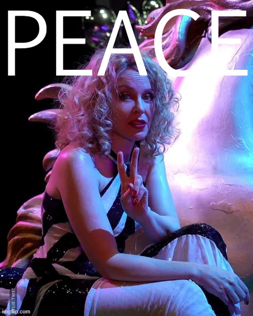 Kylie peace [set of the "Say Something" music video] | PEACE | image tagged in kylie peace sign,music video,music videos,peace,pop music,pop culture | made w/ Imgflip meme maker