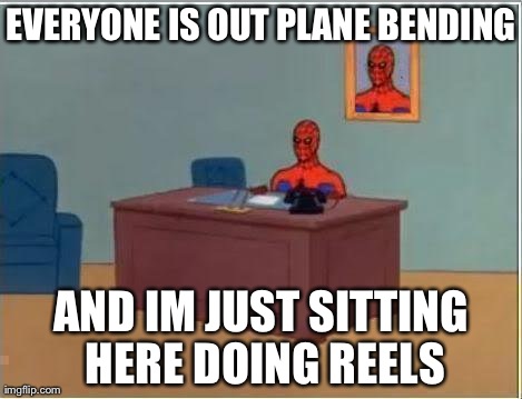 Spiderman Computer Desk Meme | EVERYONE IS OUT PLANE BENDING AND IM JUST SITTING HERE DOING REELS | image tagged in memes,spiderman | made w/ Imgflip meme maker