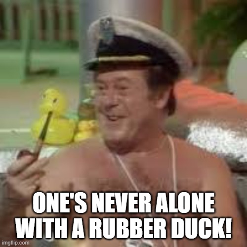 Rubber Duck |  ONE'S NEVER ALONE WITH A RUBBER DUCK! | image tagged in hitchhiker's guide to the galaxy,h2g2,golgafrinchams,rubber ducks | made w/ Imgflip meme maker