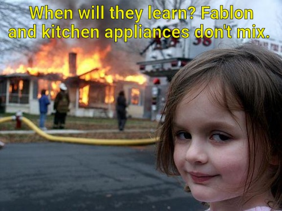 Fablon and kitchen appliances don't mix | When will they learn? Fablon and kitchen appliances don't mix. | image tagged in memes,disaster girl | made w/ Imgflip meme maker