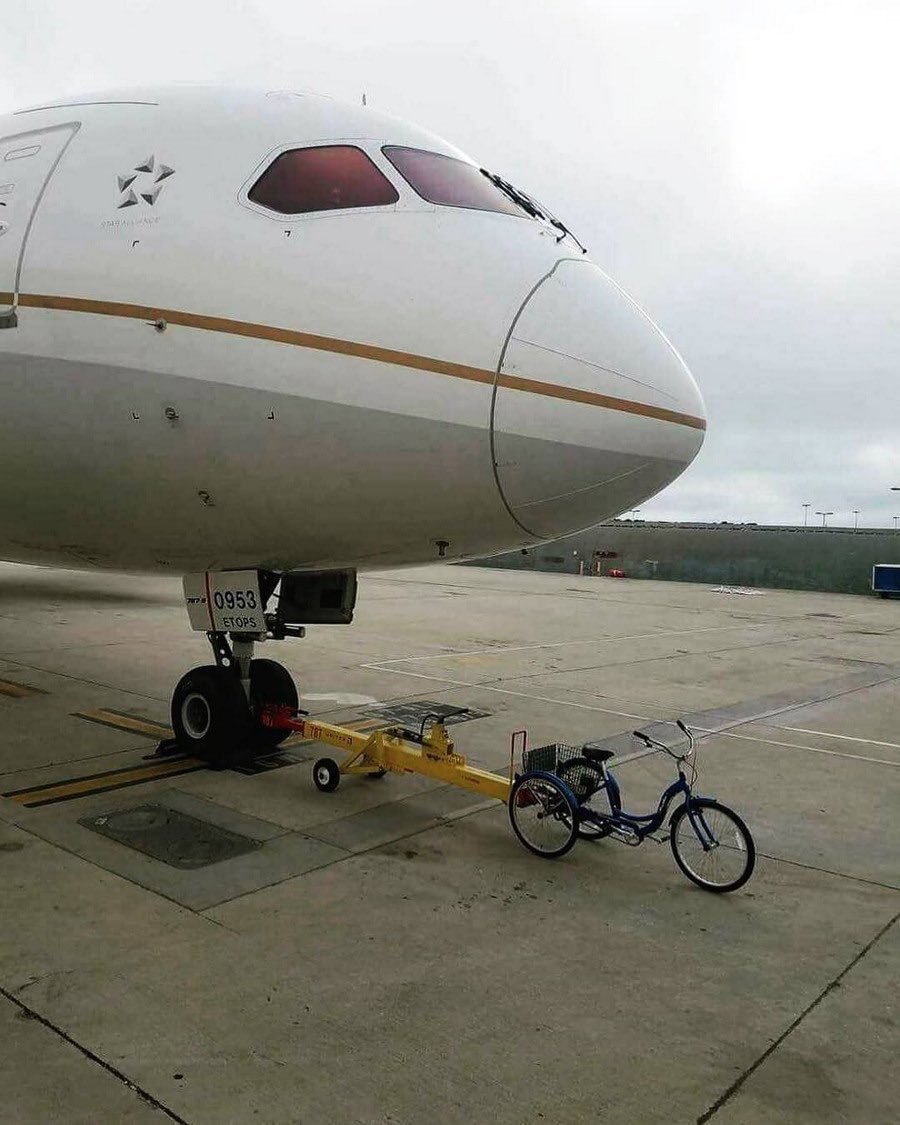Bicycle pulling plane Blank Meme Template
