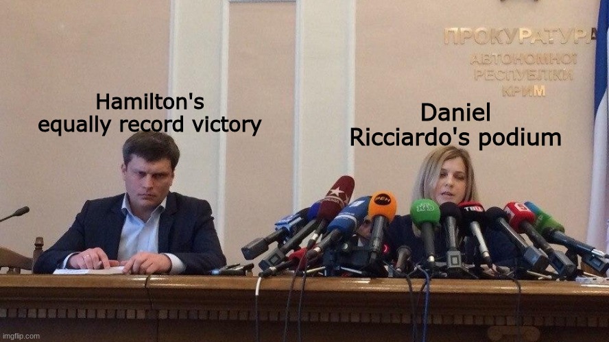 Natalia Poklonskaya Behind Microphones | Daniel Ricciardo's podium; Hamilton's equally record victory | image tagged in natalia poklonskaya behind microphones | made w/ Imgflip meme maker