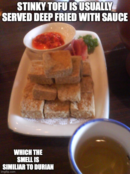 Stinky Tofu | STINKY TOFU IS USUALLY SERVED DEEP FRIED WITH SAUCE; WHICH THE SMELL IS SIMILIAR TO DURIAN | image tagged in food,memes | made w/ Imgflip meme maker