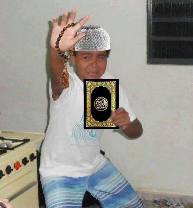 Scared kid holding Quran Blank Meme Template