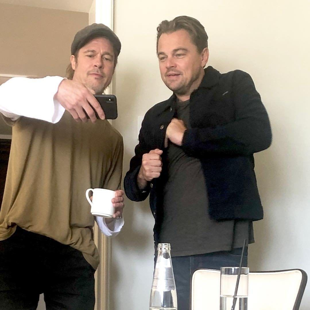 High Quality Brad Pitt Showing Leo DiCaprio Phone Blank Meme Template
