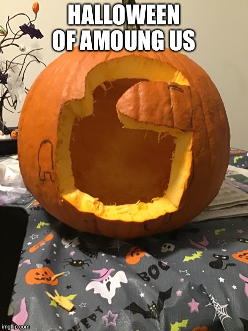 Amoung us in a pumpkin | HALLOWEEN OF AMOUNG US | image tagged in halloween,funny,pumpkin,decorating,memes,epic | made w/ Imgflip meme maker