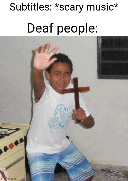 kid with cross | Subtitles: *scary music* Deaf people: | image tagged in kid with cross | made w/ Imgflip meme maker