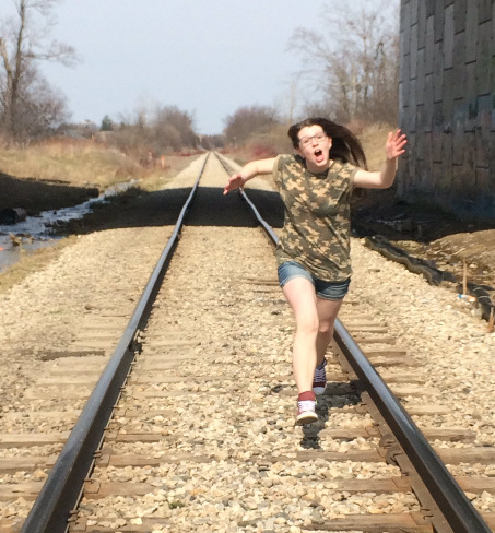 High Quality girl running on train tracks Blank Meme Template