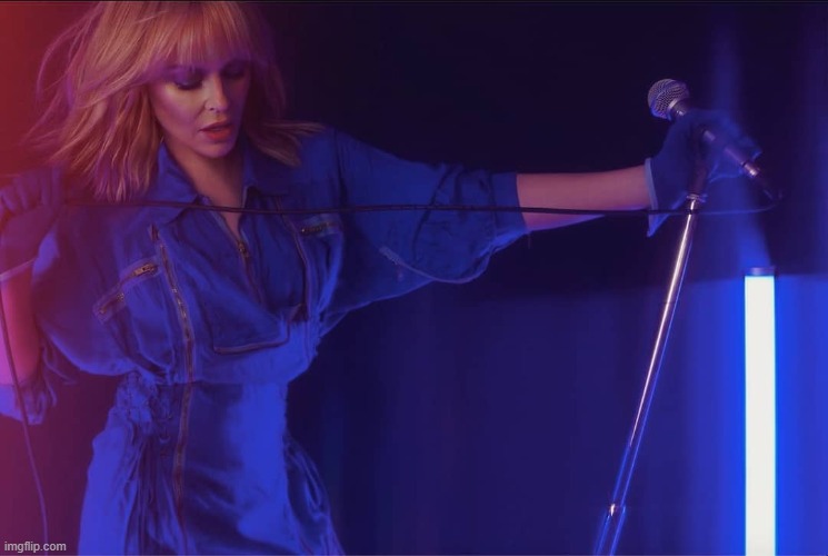 "Disco" hits #1 on iTunes in 10 countries, including significantly the U.S. | image tagged in kylie disco singing | made w/ Imgflip meme maker