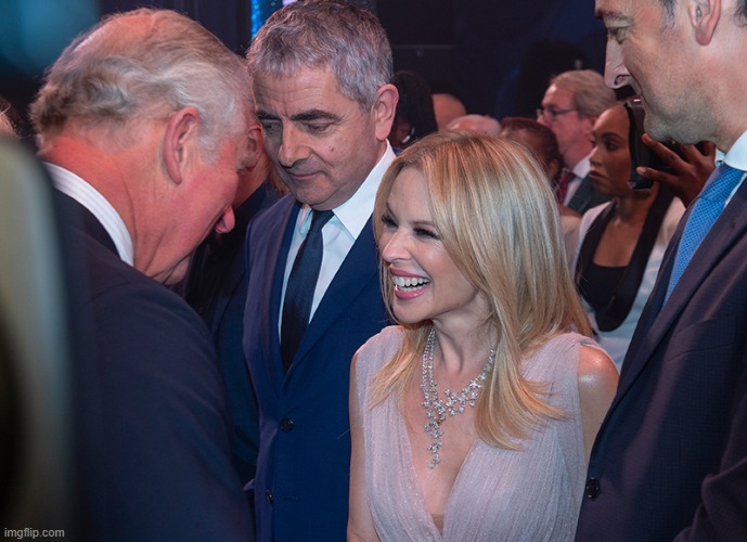 Meeting the Prince of Wales after an all-star performance for his 70th birthday at The London Palladium. | image tagged in kylie prince of wales | made w/ Imgflip meme maker