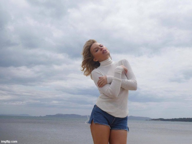 cold, lonely, wearing seasonally-inappropriate shorts: she should just go home | image tagged in kylie beach | made w/ Imgflip meme maker