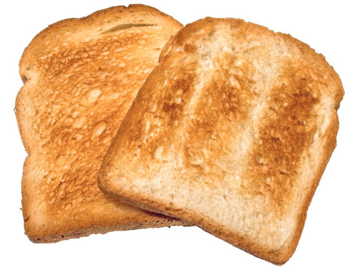 Кусок тостового хлеба. Хлеб. Хлеб из тостера. Хлеб на прозрачном фоне. Хлеб на белом фоне.