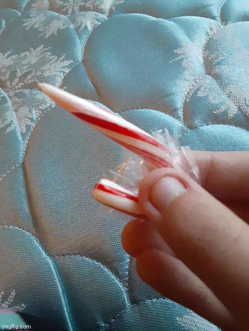 i weaponized a candy cane | image tagged in candy cane,weapon of mass destruction,lethal weapon | made w/ Imgflip meme maker