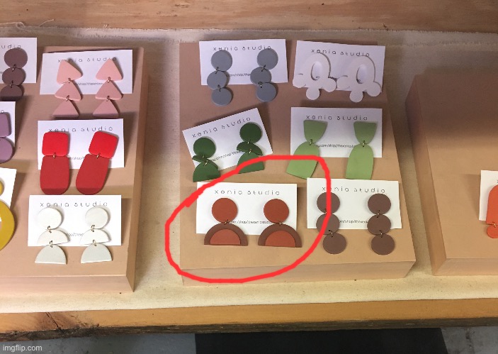 I was looking at these earrings, and one looked like the orange man icon | image tagged in funny,orange man | made w/ Imgflip meme maker