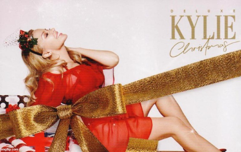 why would she objectify herself like that like a present | image tagged in kylie christmas,christmas,merry christmas | made w/ Imgflip meme maker