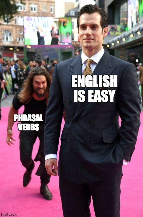 Phrasal Verbs | ENGLISH IS EASY; PHRASAL VERBS | image tagged in jason momoa sneaking up to henry cavill | made w/ Imgflip meme maker